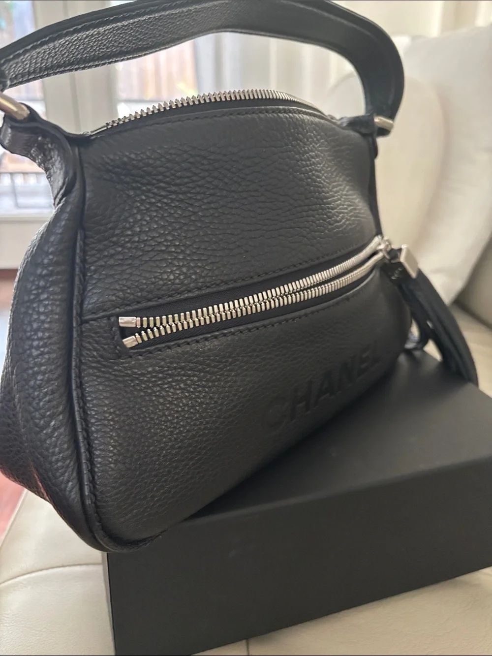 CHANEL Black Pebbled Leather Shoulder Bag with Tassel Zip